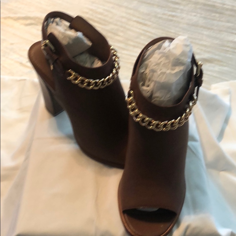Coach open toe mules with gold accents